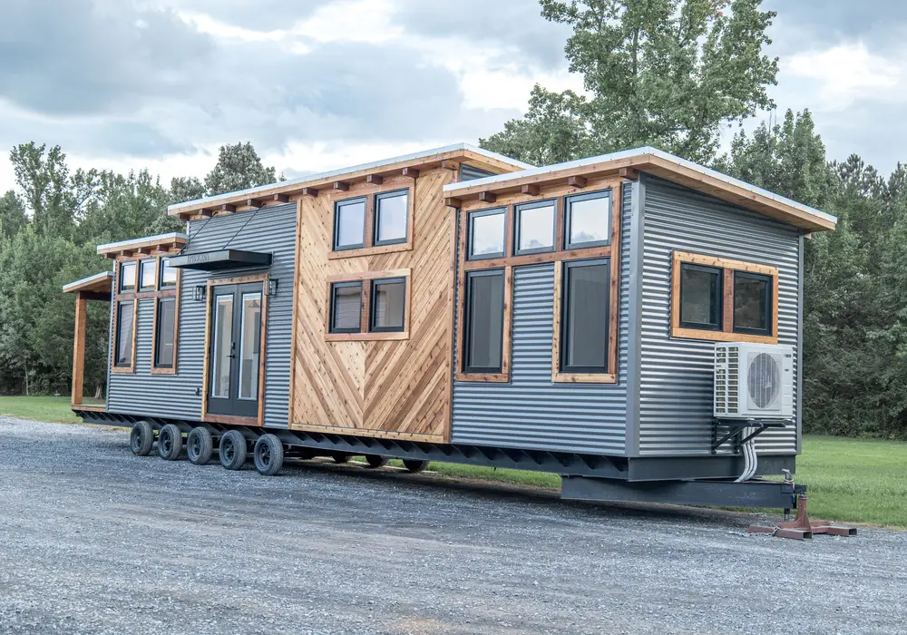 Timbercraft Big Sky model is a modern rustic and luxurious tiny home park model! image 1