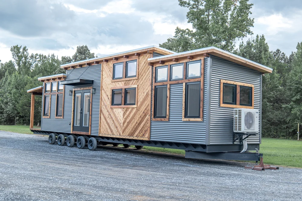 Timbercraft Big Sky model is a modern rustic and luxurious tiny home park model! image 1