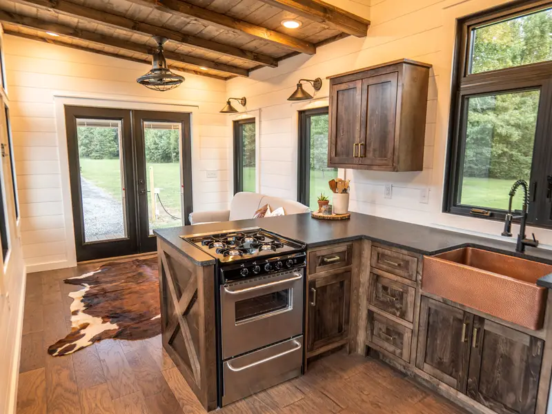 Timbercraft Big Sky model is a modern rustic and luxurious tiny home park model! photo 4