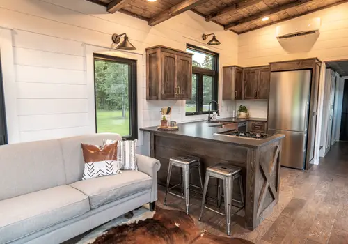 Timbercraft Big Sky model is a modern rustic and luxurious tiny home park model! detail photo 3