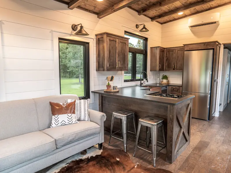 Timbercraft Big Sky model is a modern rustic and luxurious tiny home park model! photo 3