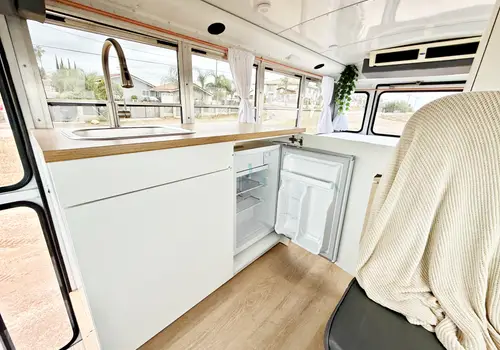 Road-Ready Tiny Home Bus – Just 32K Miles! image 2