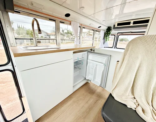 Road-Ready Tiny Home Bus – Just 32K Miles! image 2
