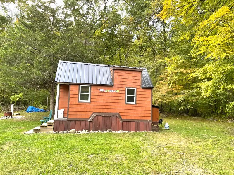 Turnkey Cedar Tiny House on Wheels — Proven Full-Time Living, RV Title photo 2