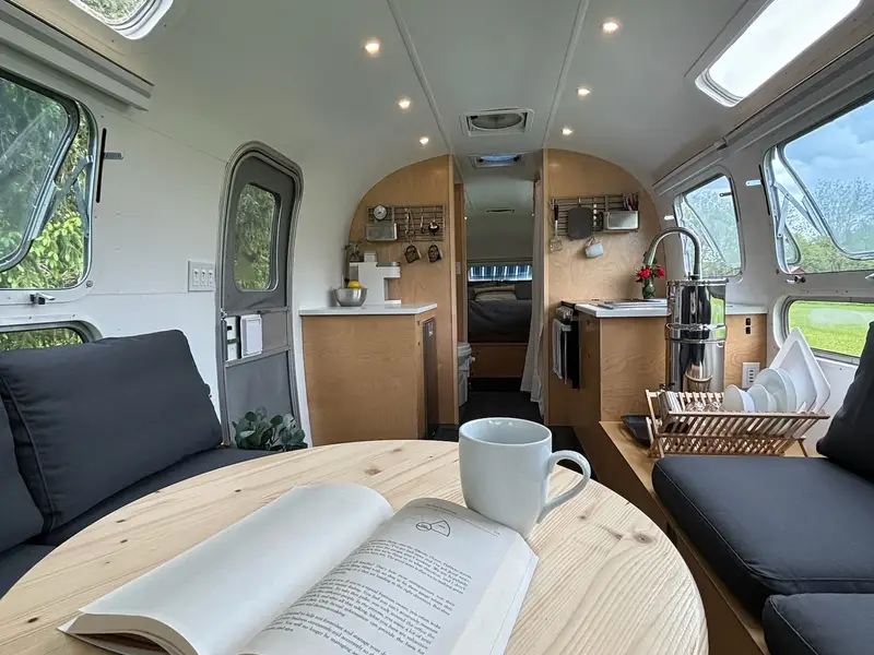 Off-Grid Tiny House on Wheels | Fully Renovated 30' Vintage Airstream | 1,200W Solar + 600Ah Battery | Composting Toilet | Mini Split photo 3