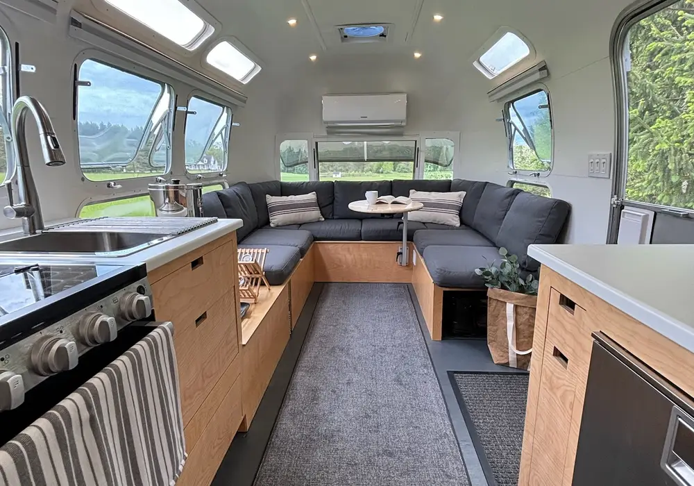 Off-Grid Tiny House on Wheels | Fully Renovated 30' Vintage Airstream | 1,200W Solar + 600Ah Battery | Composting Toilet | Mini Split — 1 bedroom Tiny House Trailer — 656 sqft for sale in Honeoye Falls, New York