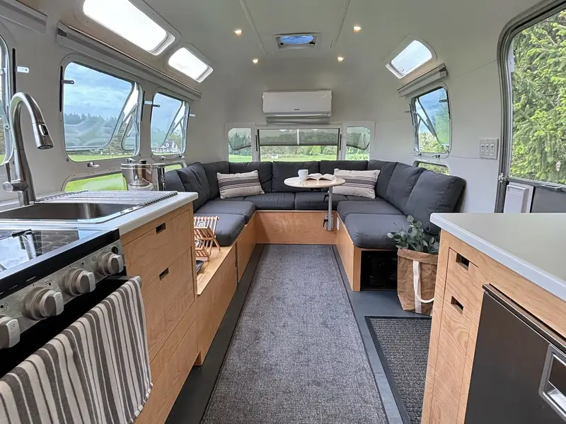 Off-Grid Tiny House on Wheels | Fully Renovated 30' Vintage Airstream | 1,200W Solar + 600Ah Battery | Composting Toilet | Mini Split — 1 bedroom Tiny House Trailer — 656 sqft for sale in Honeoye Falls, New York