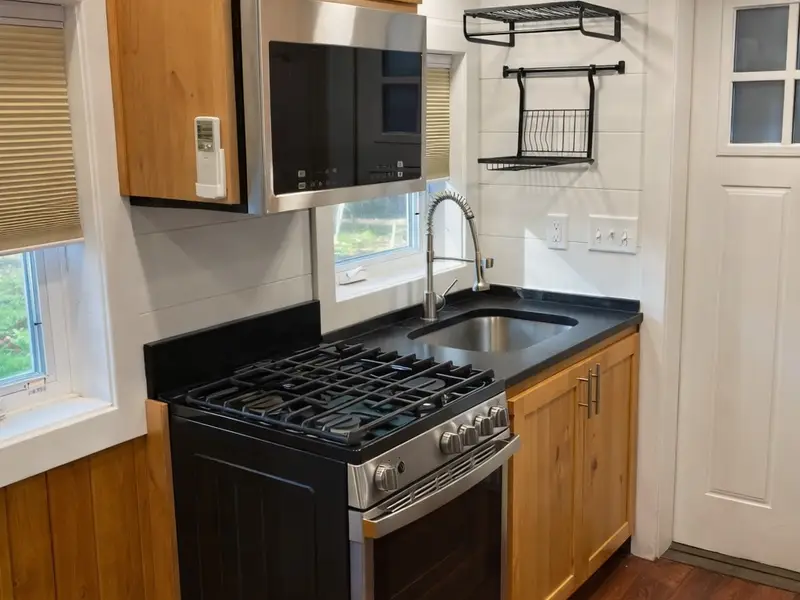Charming Off-Grid Tiny Home Container For Sale! photo 3