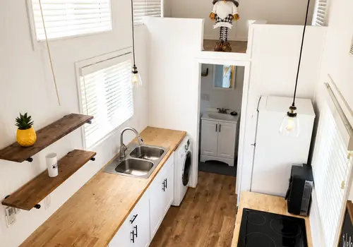 Noah Certified Farmhouse Tiny Home on Wheels in Lake Lanier detail photo 2