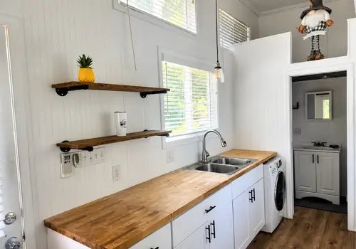 Noah Certified Farmhouse Tiny Home on Wheels in Lake Lanier detail photo 5