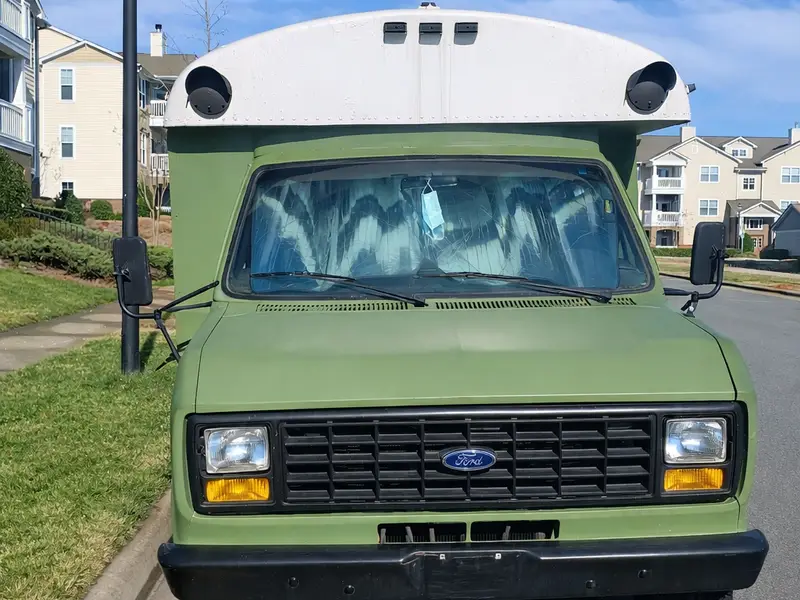 "Greenie" Off-Grid Ready Ford Econoline Skoolie For Sale! photo 3