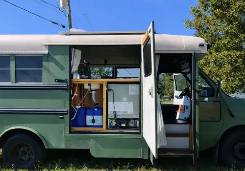 "Greenie" Off-Grid Ready Ford Econoline Skoolie For Sale! detail photo 2