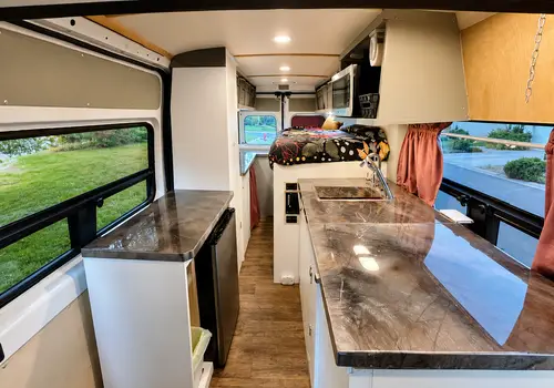Off-Grid Adventure Van | Newer Engine, Solar Power, Indoor Shower detail photo 4