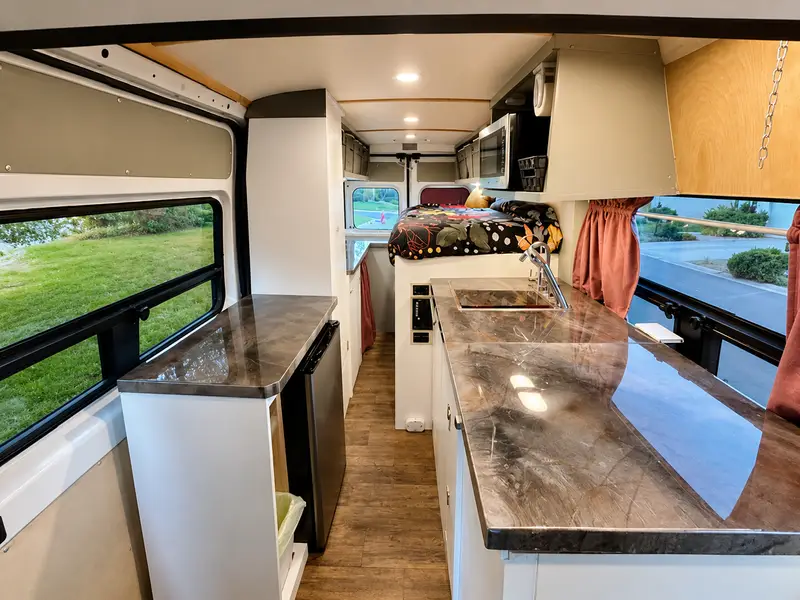 Off-Grid Adventure Van | Newer Engine, Solar Power, Indoor Shower photo 4