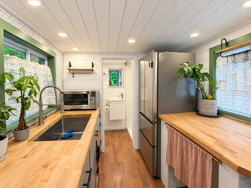 24 Ft Tiny Home on Wheels | Full Kitchen, Loft & Year-Round Living photo 4