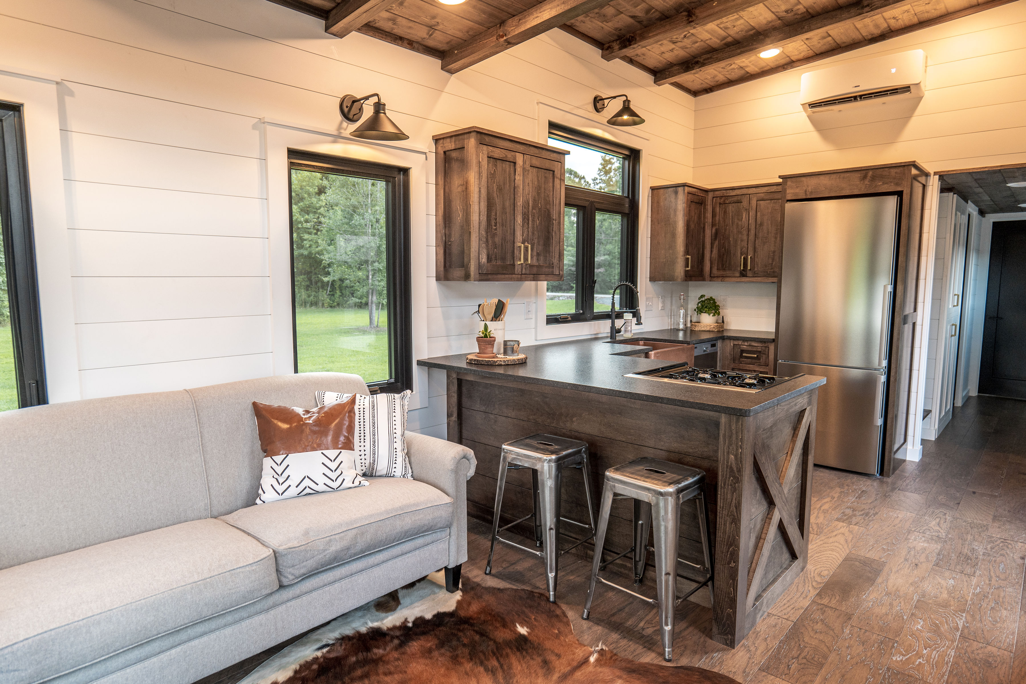Timbercraft Big Sky model is a modern rustic and luxurious tiny home park model! image 3